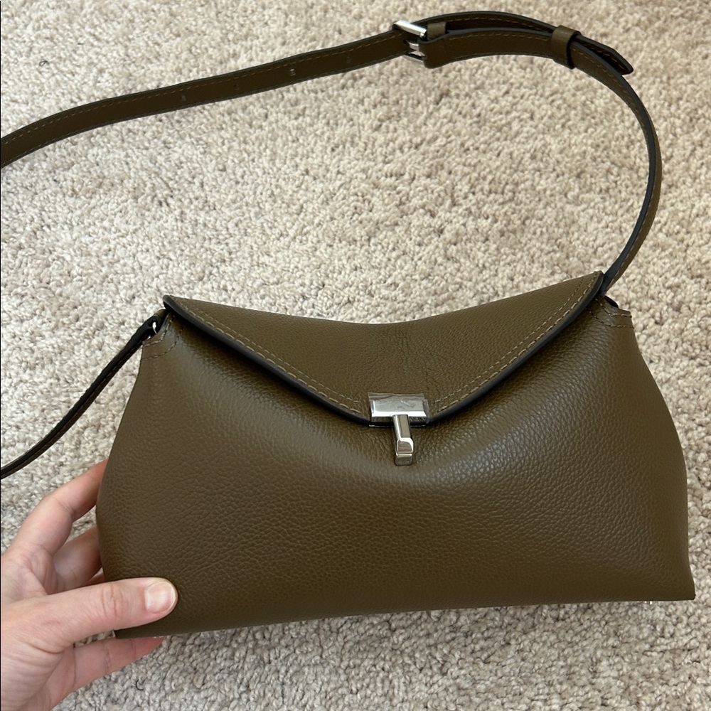 Toteme T-lock convertible clutch.